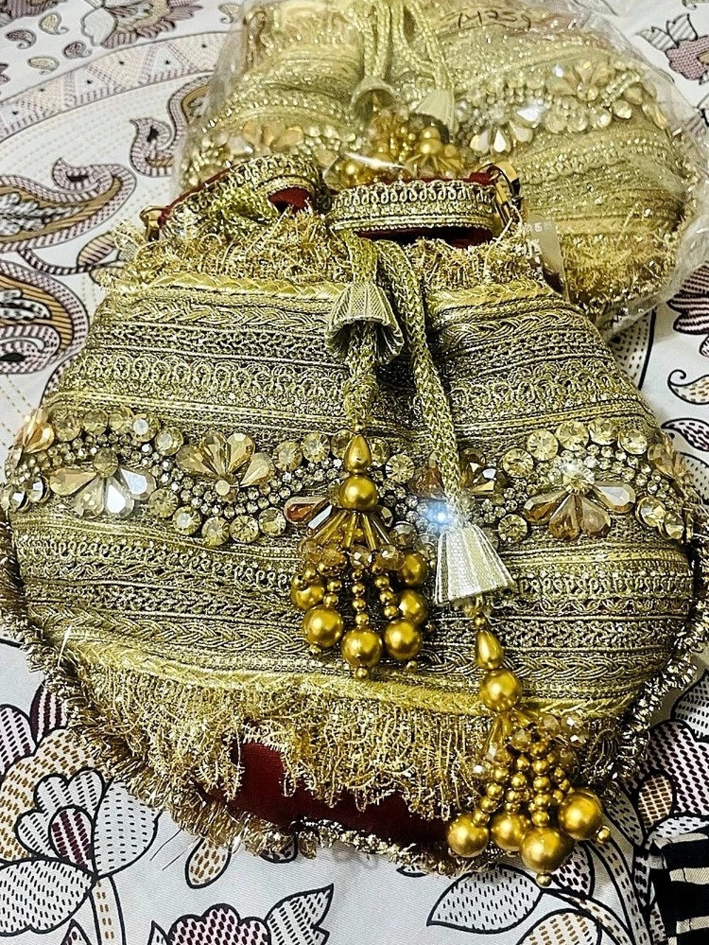 Embellished Gold & Red potli bag